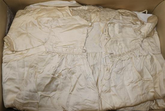 A small collection of ivory silk and linen childrens clothing, Christening gowns, etc.